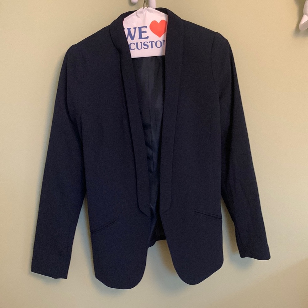 H&M navy blue jacket with pocket imitation. Size 4. Good condition.